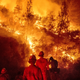 Cal Fire personnel observe the Ranch Fire, part of the Mendocino Complex Fire, on August 7th, 2018 near the city of Ladoga, California.